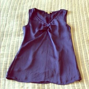 Purple sleeveless blouse